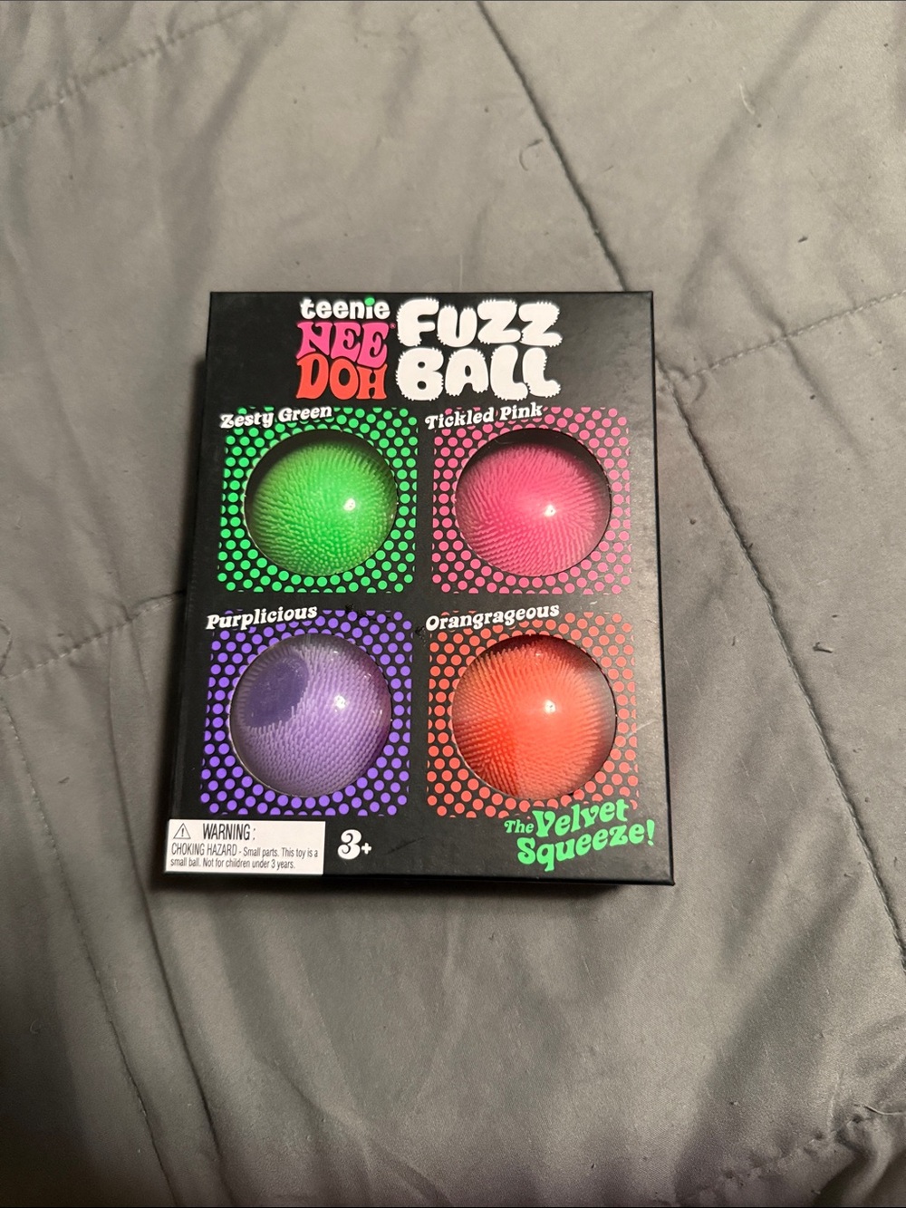 teenie NEEDOH Fuzz Ball 4-Pack — Green, Pink, Purple, Orange